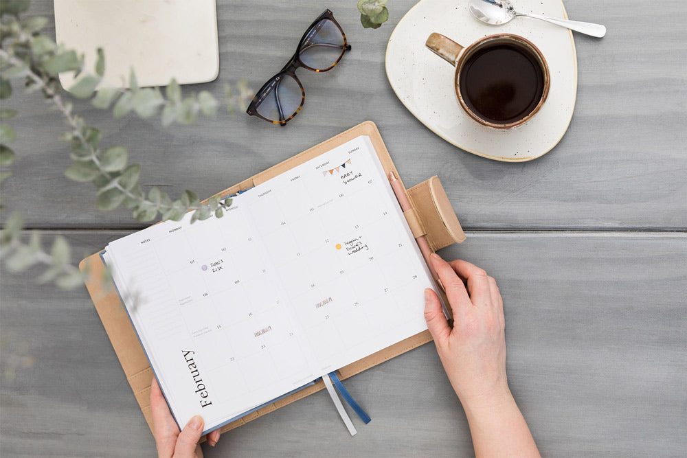 Curation diary open on a desk