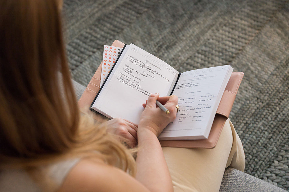 Curation diary open on a person's lap