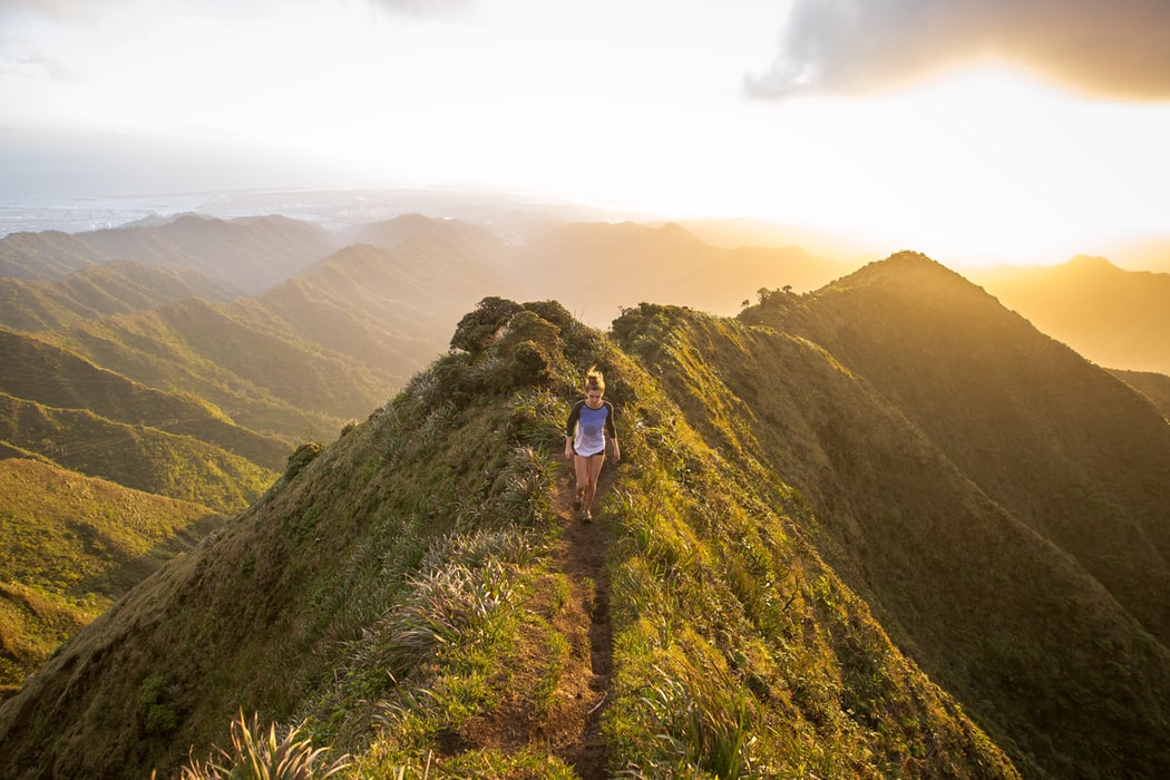 Person climbing a mountain