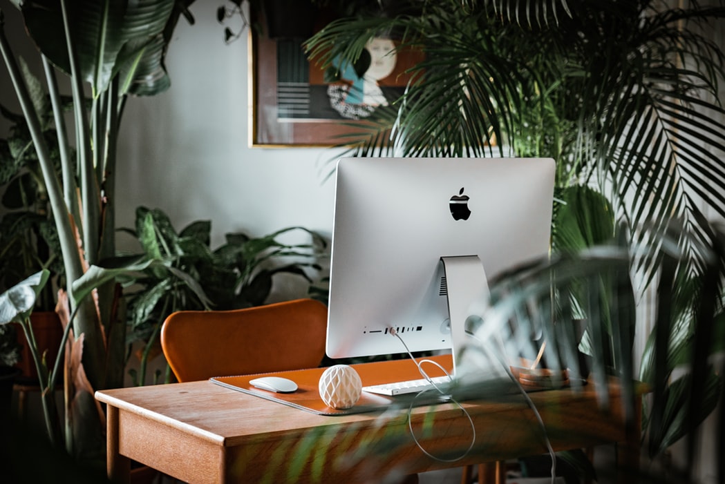 Desk with computer on it